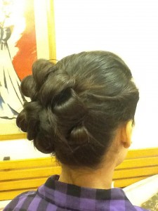 Twist it and roll the back into flower buds