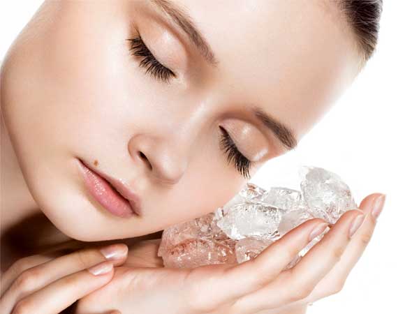 applying ice cubes to reduce pimples