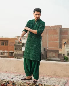 khushal khan wearing green color kurta and dhoti shalwar