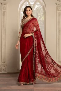 maroon colored saree with printed blouse