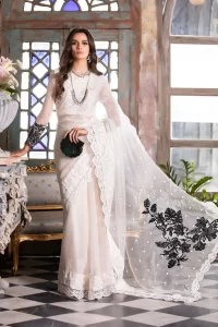white colored saree with pearls and black floral embroidery