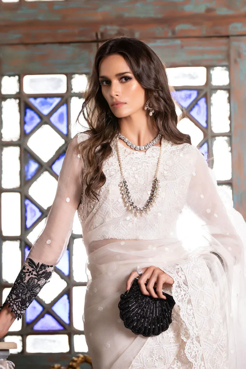 white colored saree with pearls and black floral embroidery