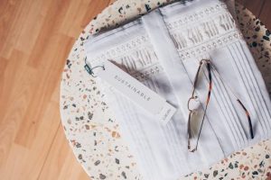 Image source: https://unsplash.com/photos/silver-framed-eyeglasses-on-white-and-blue-floral-textile-0jQMqAkOIBs